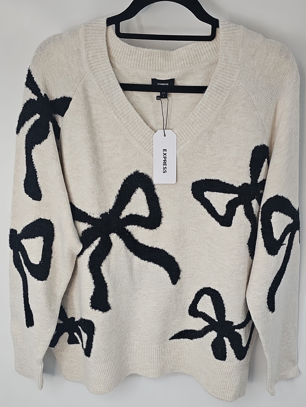 Express Cream w Black Glitter Bows Vneck Long Sleeve Sweater Sz:L Dainty - Picture 1 of 15